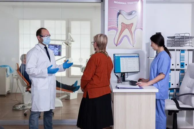 Dentist Doctor With Face Mask Explaining Diagnosis Senior Woman Patient Stomatology Waiting Area Hallway Elderly Man Sitting Chair Teeth Treatment X - DANB General Chairside Assisting (GC) Test study guide