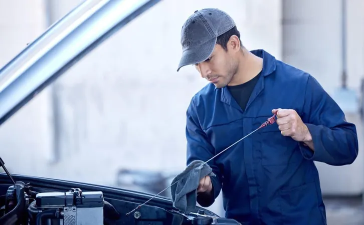 Lubrication Is Important All Engines Cropped Shot Handsome Young Male Mechanic Working Engine Car Service X - Diesel Technician Certification study guide