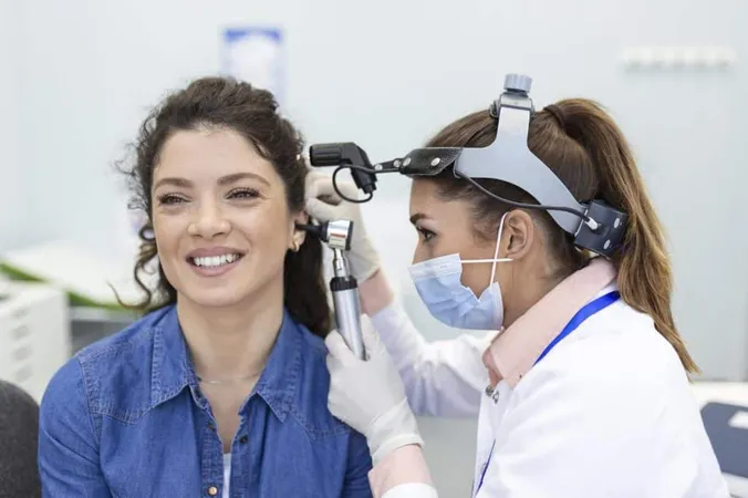 Hearing Exam Otolaryngologist Doctor Checking Woman S Ear Using Otoscope Auriscope Medical Clinic X - Ear, Nose, and Throat Specialist Certification study guide