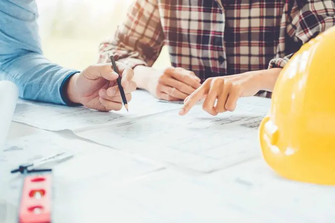 People Working Table X - Engineering & Science Admissions Test study guide