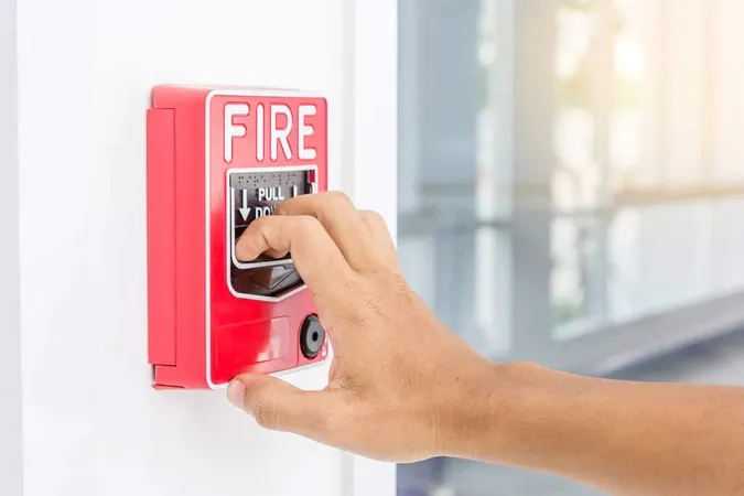 Hand Man Pulling Fire Alarm Swit - Fire Safety study guide