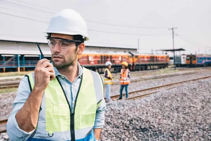 Man Working With Umbrella 1 X - Federal Railroad Administration Certification study guide