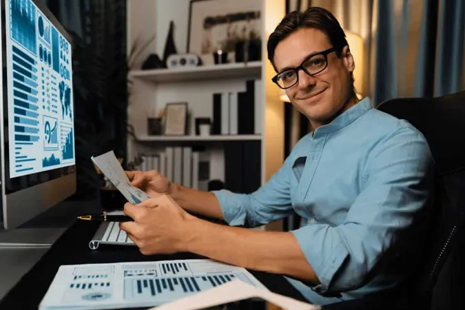 Businessman Holding Paperwork Report Looking Camera Pc Screen Pecuniary X - Financial Information Associate Certification study guide