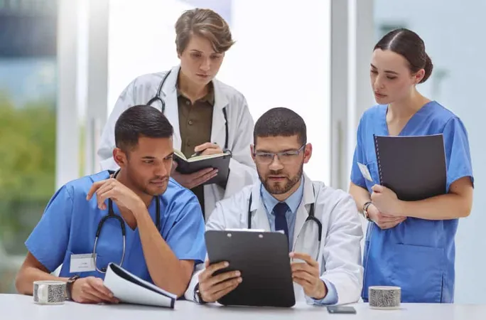 Analysing Patient Records Together Shot Group Medical Practitioners Working Together Hospital Boardroom X - Fellowship of the Royal Australian College of General Practitioners study guide