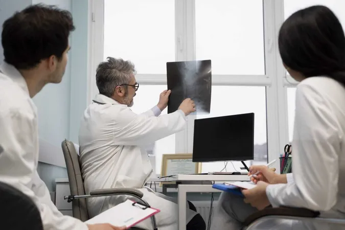 Medium Shot Doctors Looking Radiography X - Fellowship of the Royal College of Radiologists study guide