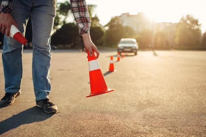 Instructor Sets Cone Driving School Concept X - G2 study guide