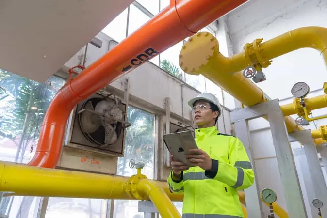 Asian Engineer Wearing Glasses Working Boiler Roommaintenance Checking Technical Data Heating System Equipmentthailand People X - Gas Pipe Technician Certification study guide