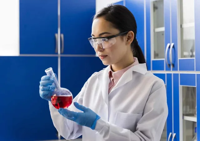 Side View Female Scientist Lab Glassware With Substance X - Histotechnician Certification study guide