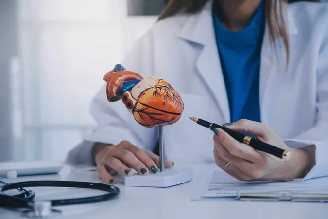 Doctor Explaining Heart Elderly Patient Doctor Explaining Heart Model Doctors Pen Point Model Heart X - International Board of Heart Rhythm Examiners study guide