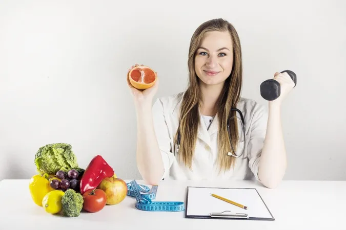 Female Dietician Holding Grapefruit Dumbbell Clinic X - Institute for Integrative Nutrition Certification study guide