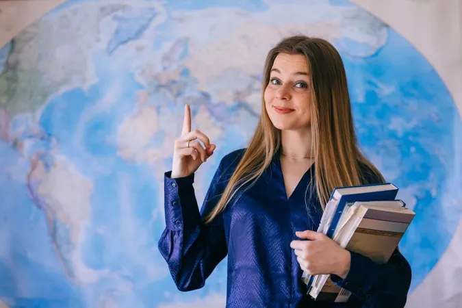 Happy Student With World Map Wall X - International Proficiency Certification study guide