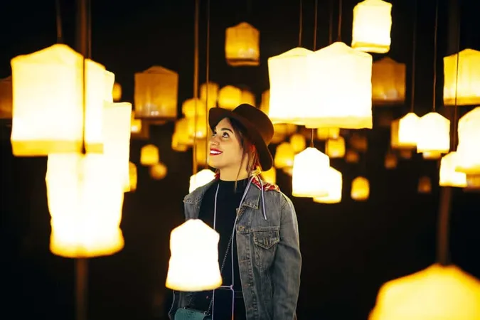 Closeup Shot Happy Young Lady Room With Many Bright Chandeliers X - Landscape Lighting Certification study guide