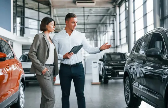 Making Agreement Man Formal Wear Helping Customer With Choice Automobile X - Certified National Automobile Dealers Association Consultant study guide