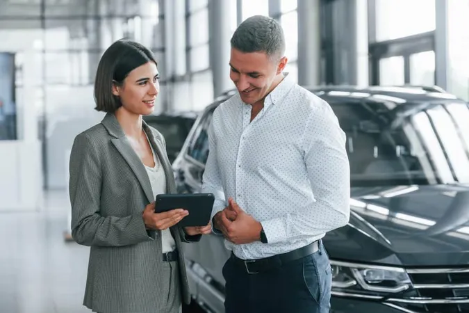 Standing Near Car Man Formal Wear Helping Customer With Choice Automobile X - Certified National Automobile Dealers Association Consultant study guide