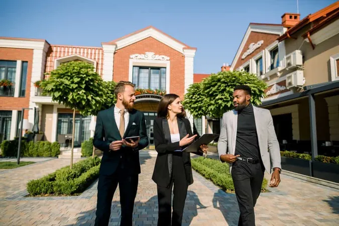 Group Three Young Multiracial Business People African Man Caucasian Man Woman Talking Each Other Walking Outdoors X - National Association of Realtors Certification study guide