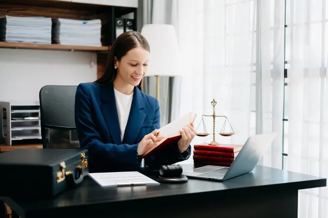 Caucasian Woman Lawyer Reading L - Notary study guide