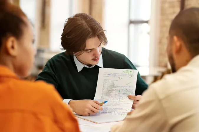 Man Studying Grammar With His Colleagues 1 - Ohio Achievement Assessment study guide