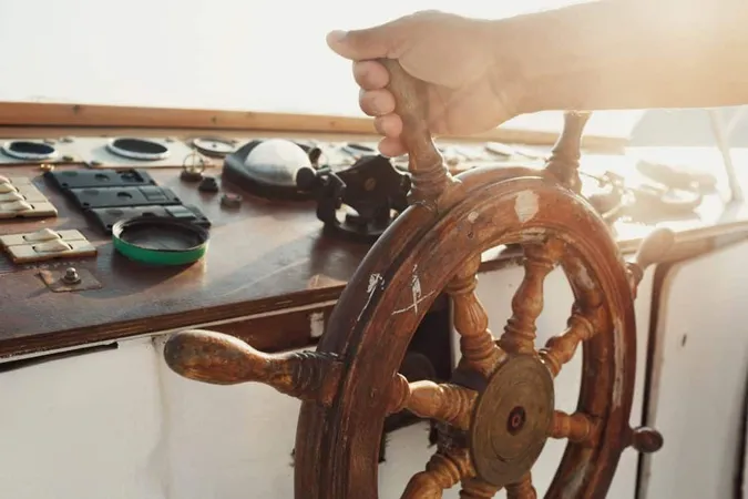 Sun Shines Wooden Wheel Held By Man X - Ordinary Seaman Exam study guide