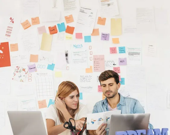 Working Colleagues Looking Paper Workplace With Laptops Stationery Nameplate R42kmfn90g1iznhfu2bmaykvhk2vcw4ibbv1npc - Programmatic Advertising Certification study guide