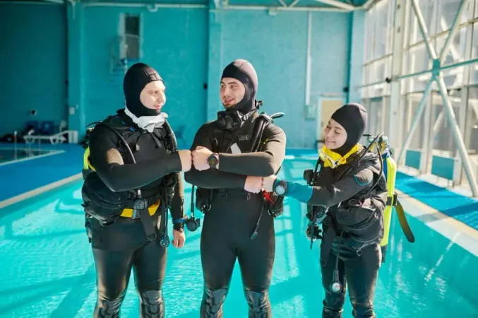 Instructor Two Divers Suits Diving School Teaching People Swim Underwater With Scuba Gear Indoor Swimming Pool Interior Background Group Training X - Certified Professional Association of Diving Instructors Diver study guide