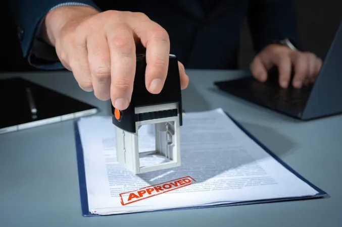 Stamp Approved Approved Stamp Businessman Stamping Document Office Closeup Business Person Hand Stamping Approved Contract Form X - Possession and Acquisition Licence study guide