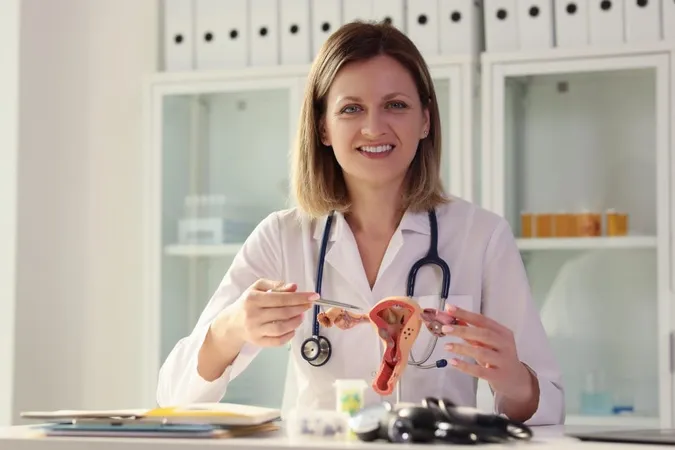 Doctor Shows Anatomical Model Uterus Closeup Gynecological Research Obstetric X - Papanicolaou Test study guide