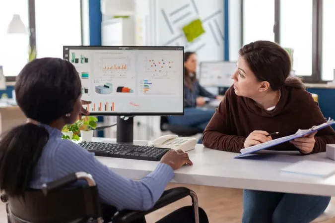 Businesswoman Discussing With Disabled Woman 1 X - Pre-service Academic Performance Assessment study guide