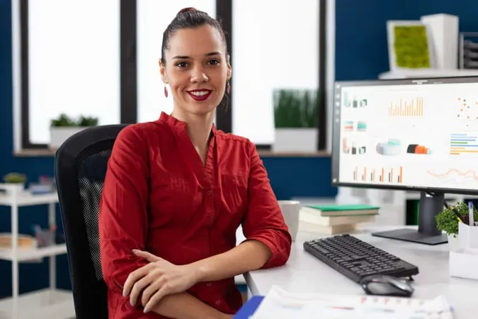 Portrait Business Woman Corporate Office Sitting Desk X - Project Controls Certification study guide