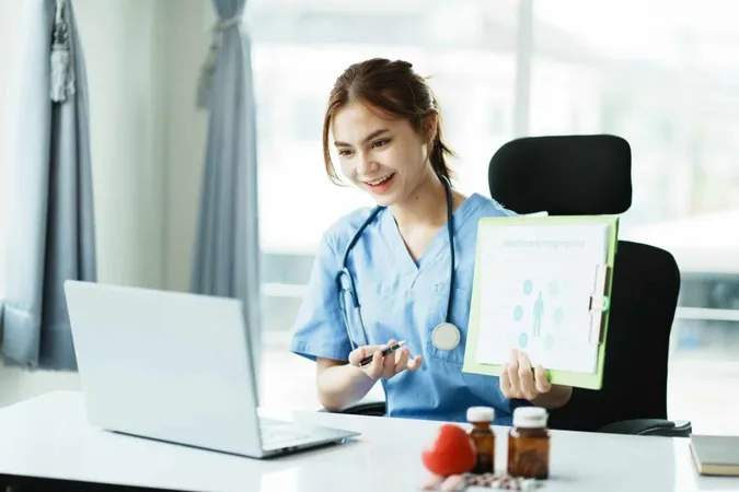 Positive Doctor Working Laptop Medical Office Portrait X - Professional and Linguistic Assessments Board study guide