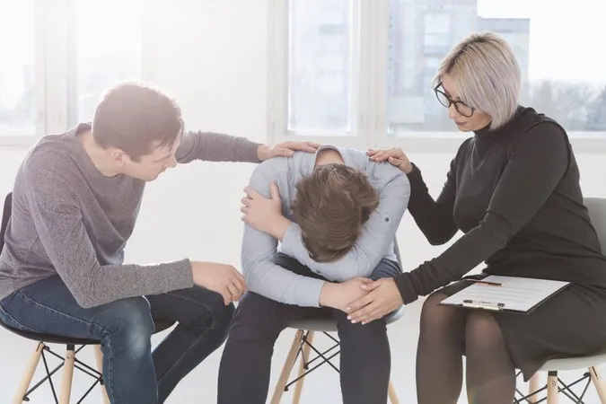 Man Woman Trying Console Patient X - Post Traumatic Stress Disorder Certification study guide