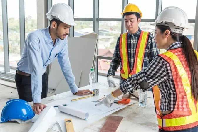 Engineers Discussing Blueprint 1 - Real Estate study guide