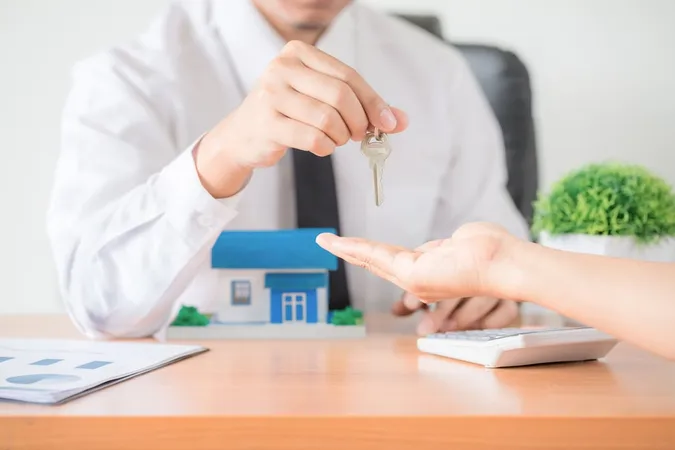 Realtor Agent Giving Key Apartme - Real Estate study guide