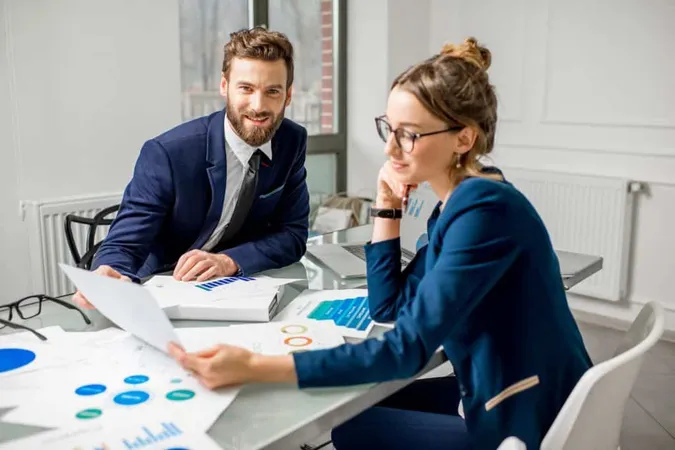Marketer Analityc Manager Team Dressed Suits Working With Paper Charts Laptops White Office Interior X - Registered Investment Advisor study guide
