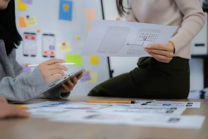 Creative Digital Development Agency Developer Team Brainstorming Their Project With Laptop Digital Tablet X - Rhode Island State Practice Test study guide