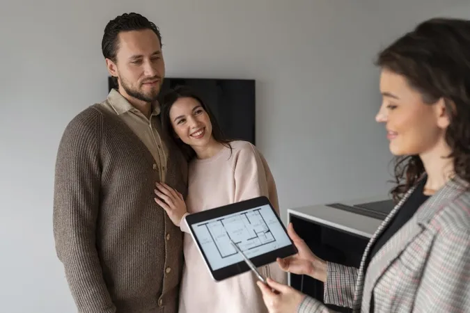 Side View Real Estate Agent Holding Tablet X - Real Property Appraiser Certification study guide