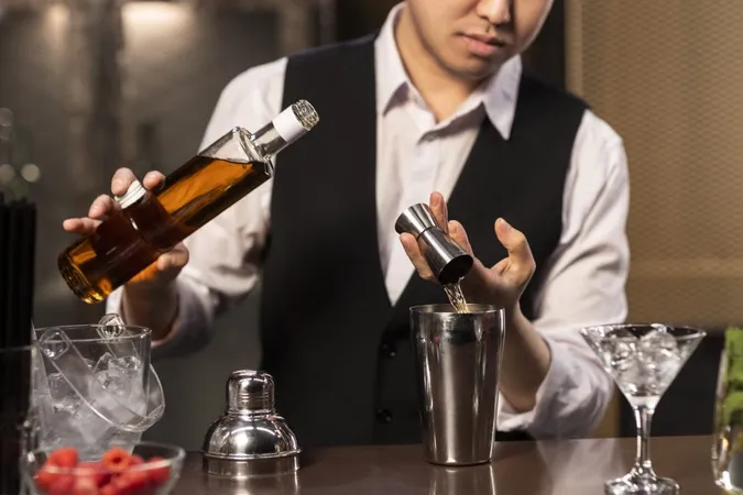 Front View Bartender Preparing Drink 1 X - Responsible Server of Alcohol Certification study guide