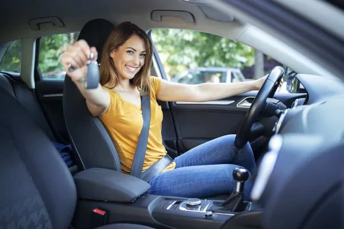 Beautiful Female Women Driver Sitting Her Vehicle Holding Car Keys Ready Drive X - Roads and Transport Authority Exam study guide