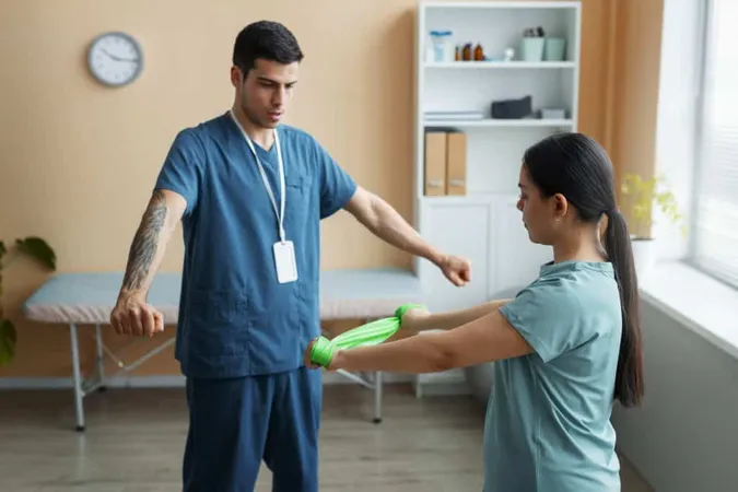 Doctor Helping Patient Rehabilitation 1 X - Sports Clinical Specialist study guide