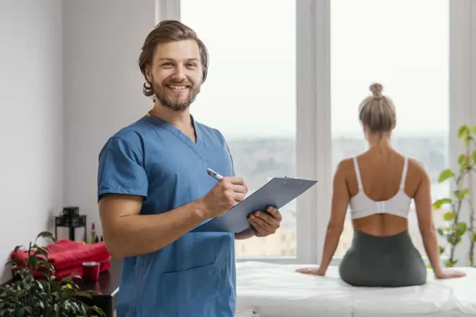 Smiley Male Osteopathic Therapist With Clipboard Female Patient Clinic X - Sports Clinical Specialist study guide