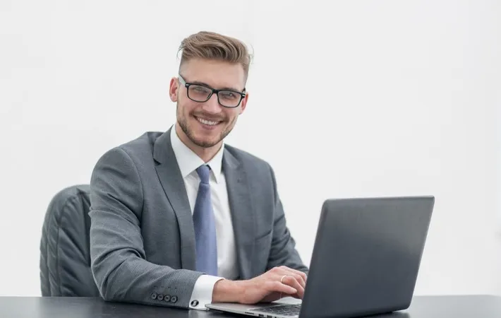 Young Businessman Sitting Deskphoto With Copy Space X - School District Leader study guide