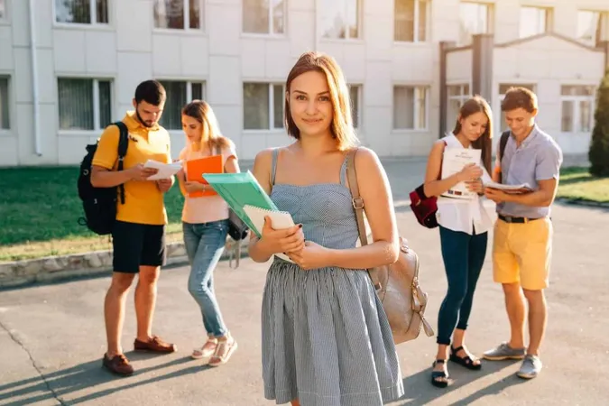 Handsome Young Girl With Red Velvet Backpack Holding Books X - Selective High School Placement Test study guide