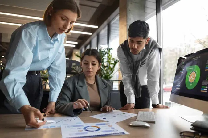 People Analyzing Checking Finance Graphs Office 1 X - Strategic Planning Professional study guide
