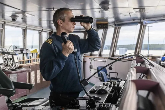 Deck Officer With Binoculars Navigational Bridge Seaman Board Vessel Commercial Shipping X - Ship Security Officer study guide