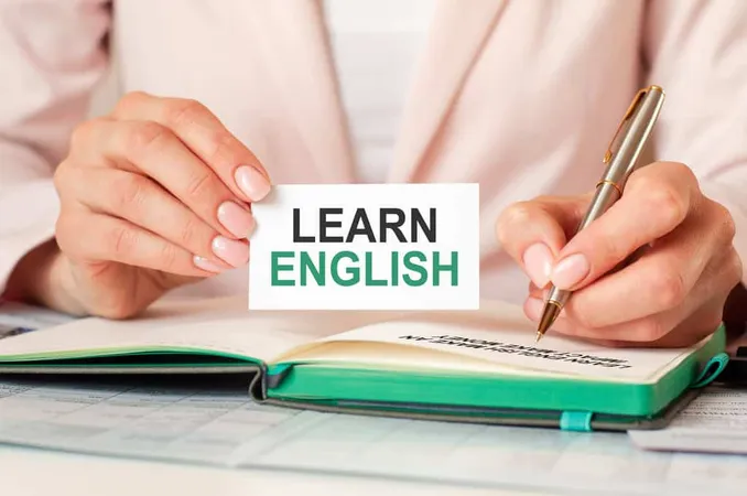 Woman Writes Notebook With Silve - TOEFL study guide