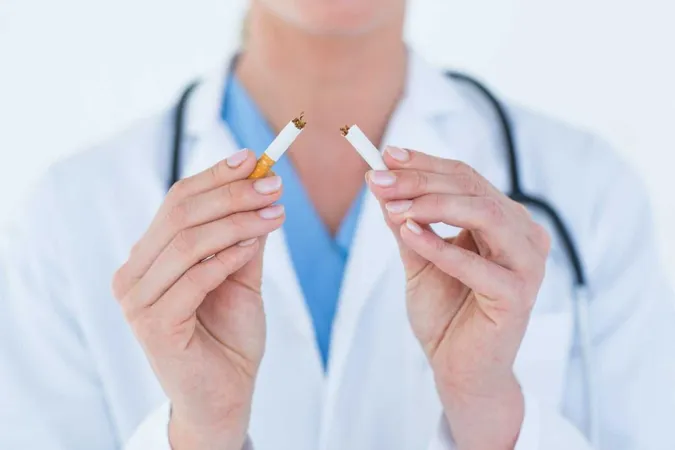 Doctor Holding Broken Cigarette X - Tobacco Treatment Specialist Certification study guide