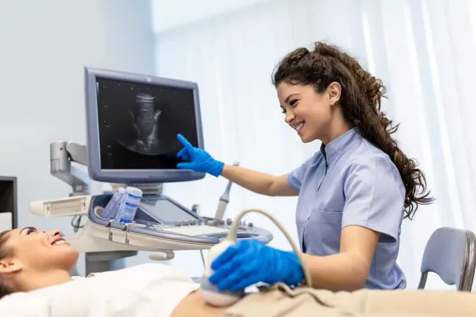 Ultrasound Diagnostic Stomach Abdominal Woman Clinic Closeup View Doctor Runs Ultrasound Sensor Patients Girl Tummy Looks Screen Diagnosis Internal Organs X - Ultrasound Technologist Certification study guide