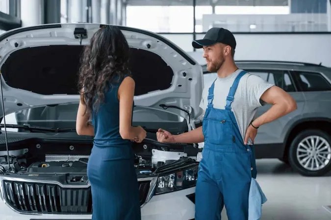 Elegant Girl Woman Auto Salon With Employee Blue Uniform Taking Her Repaired Car Back X - Volkswagen Certified Technicians study guide